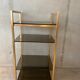 Golden brass and glass shelves