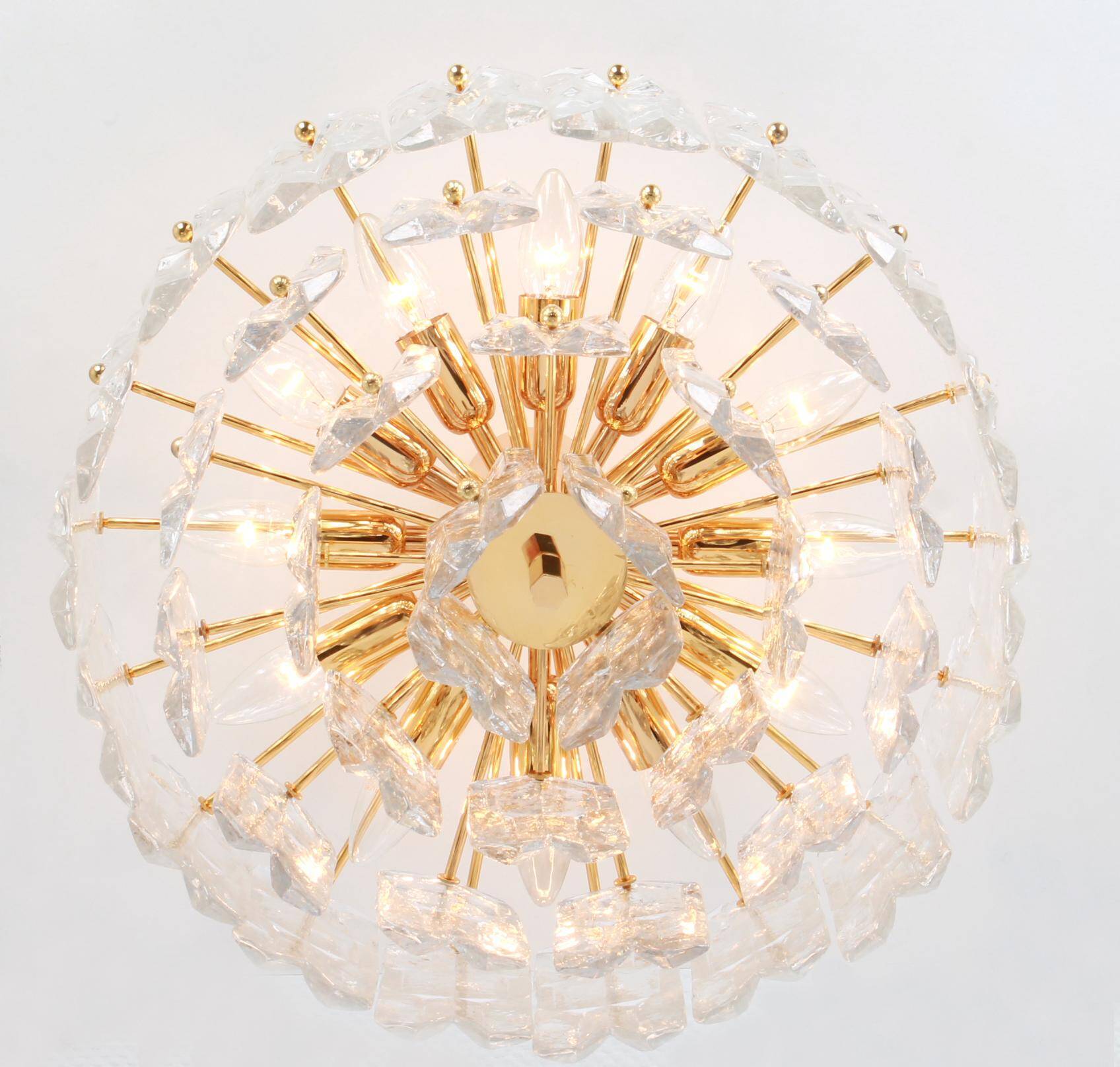 Magnificent luminaire in gilded brass and crystal glass Palazzo, Kalmar, Austria, 1970.