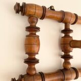 Vintage wooden wall coat rack with 4 swivel hooks from 1920