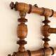 Vintage wooden wall coat rack with 4 swivel hooks from 1920