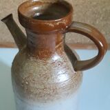 Vintage kid jug in two-tone sandstone with a handle and spout