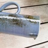 High pitcher in sandstone