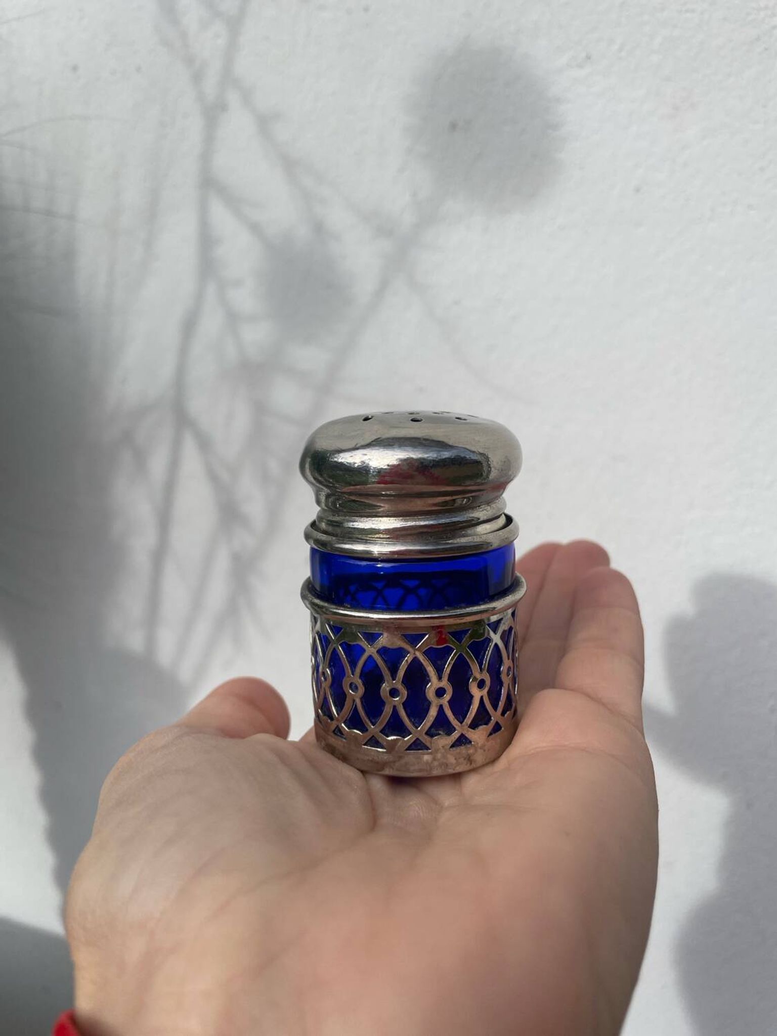 Silver-plated metal and blue glass salt and pepper shaker