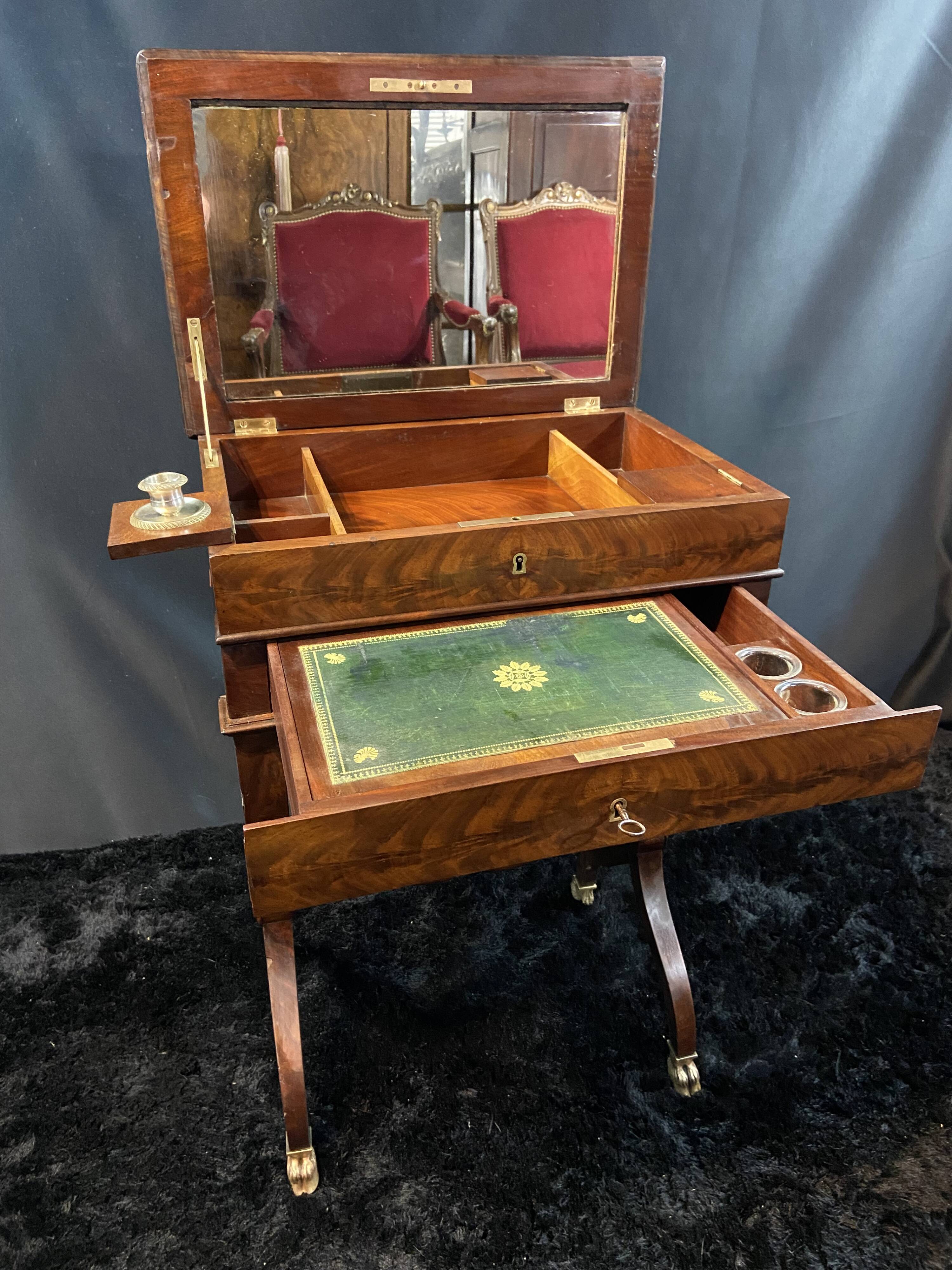 Louis-Philippe period mahogany writing desk with candlestick, 19th century