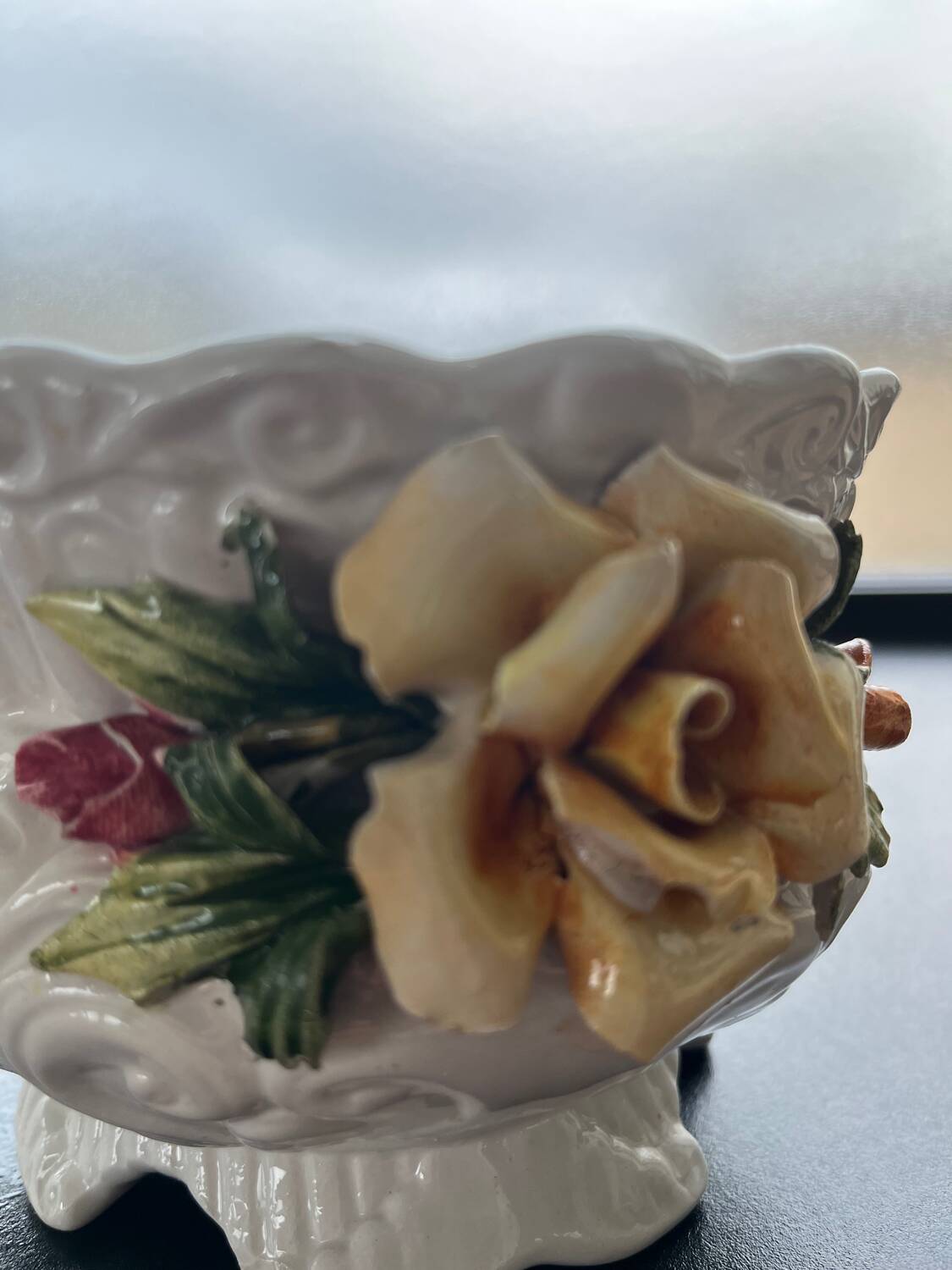 Capodimonte-style porcelain lidded sugar bowl with floral relief