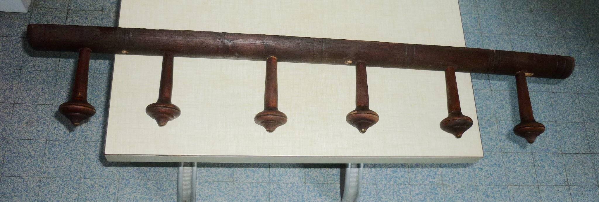 Wooden wall-mounted coat rack