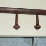 Wooden wall-mounted coat rack