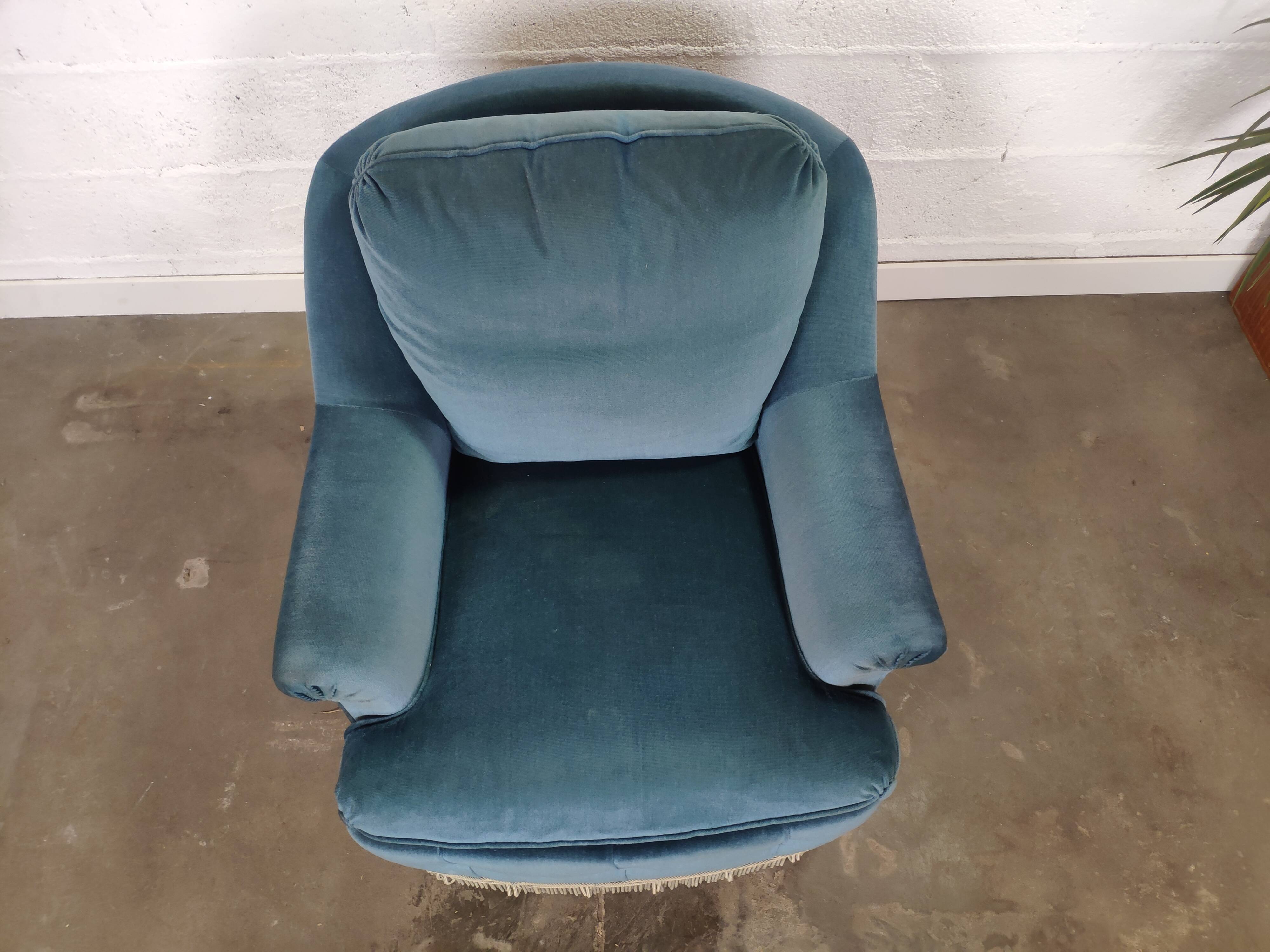 Pair of blue velvet armchairs with fringes