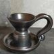 1950s iridescent black ceramic hand candle holder