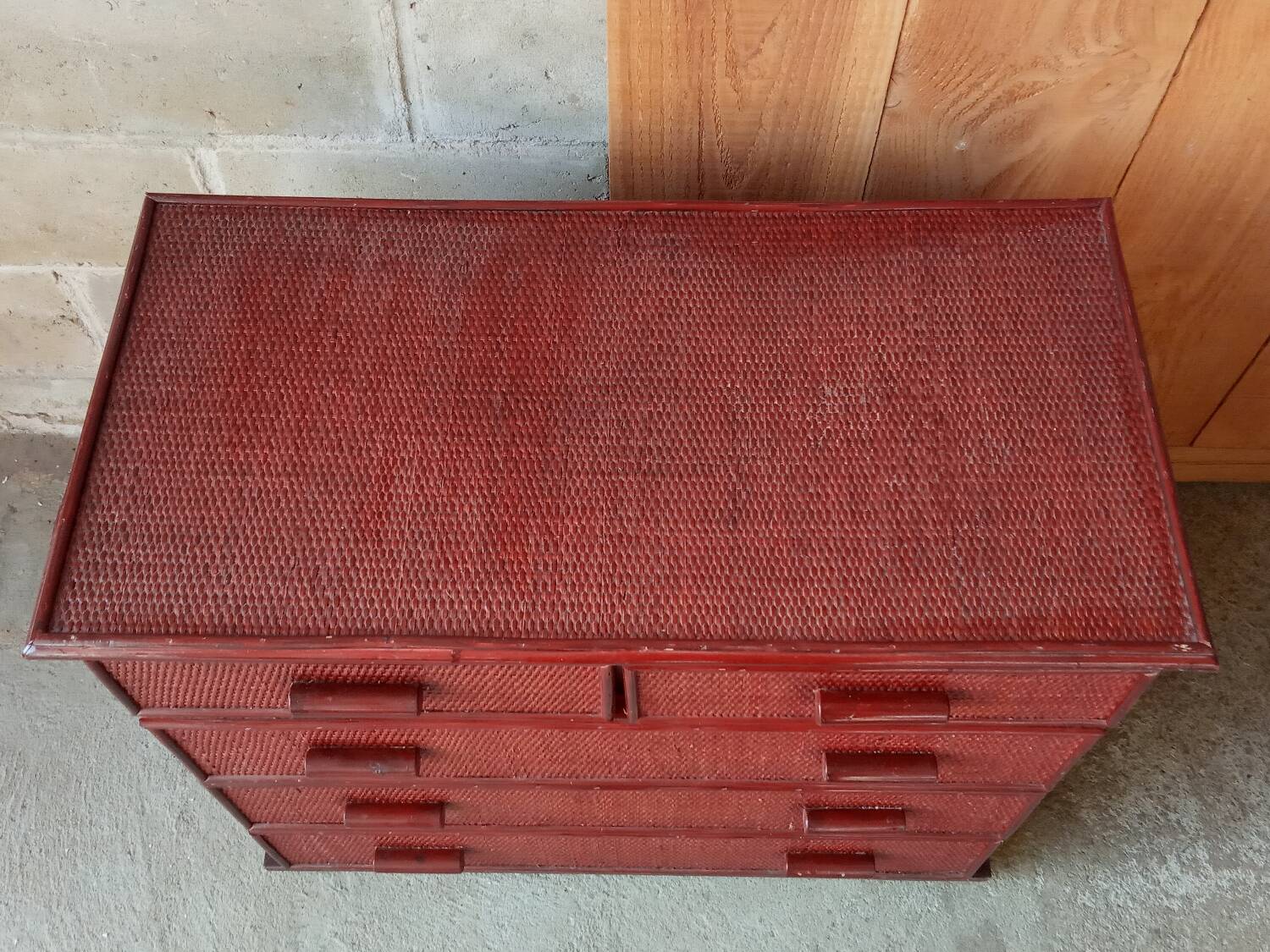 Vintage red lacquered rattan chest of drawers