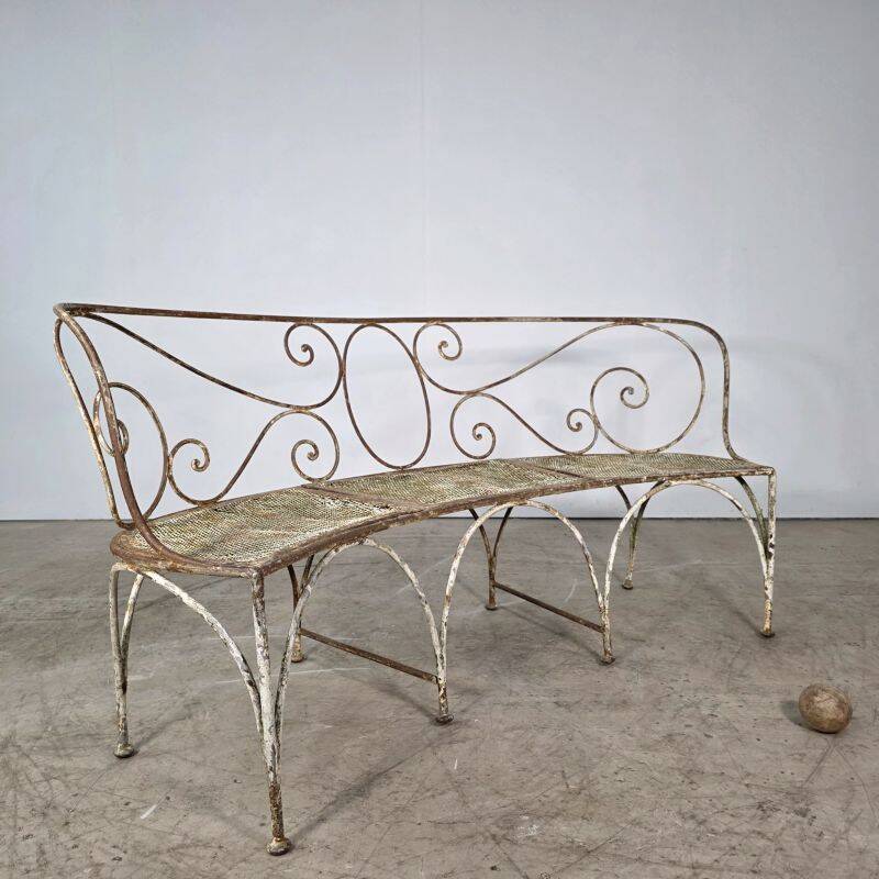 Beautiful curved garden bench from the late 19th century in iron.