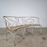 Beautiful curved garden bench from the late 19th century in iron.
