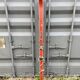 Pair of red antique skis