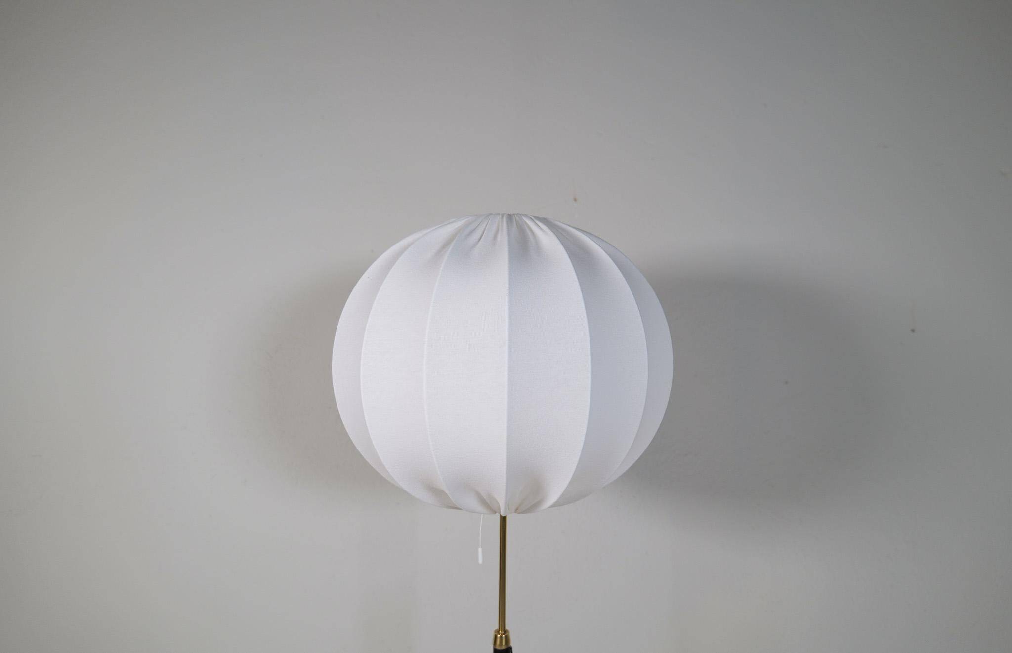 Mid-century black leather and brass floor lamp by Falkenbergs Belysning, Sweden, 1960s.