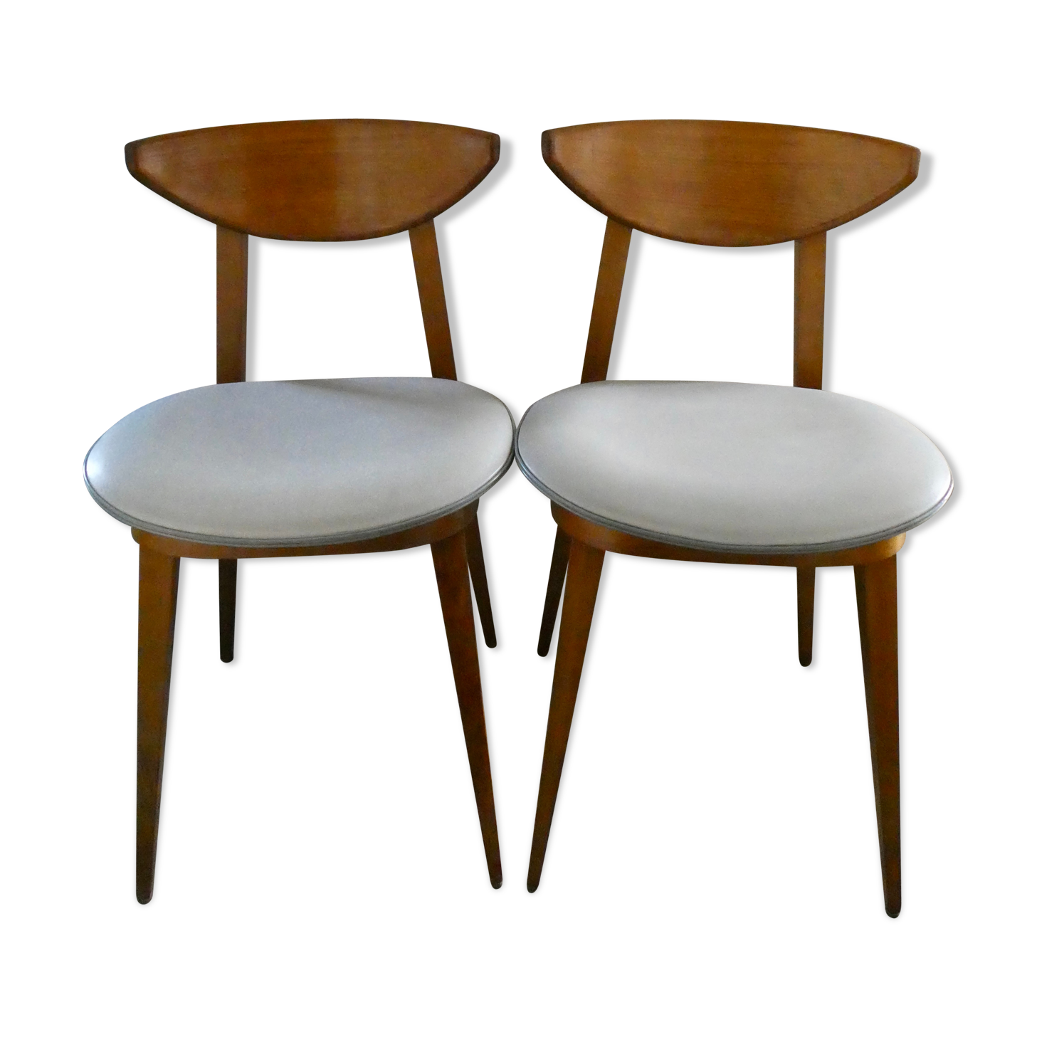 Pair of wooden chairs and skai scandinavian style