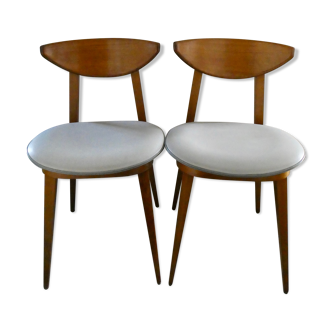 Pair of wooden chairs and skai scandinavian style