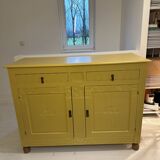Yellow wooden chest of drawers