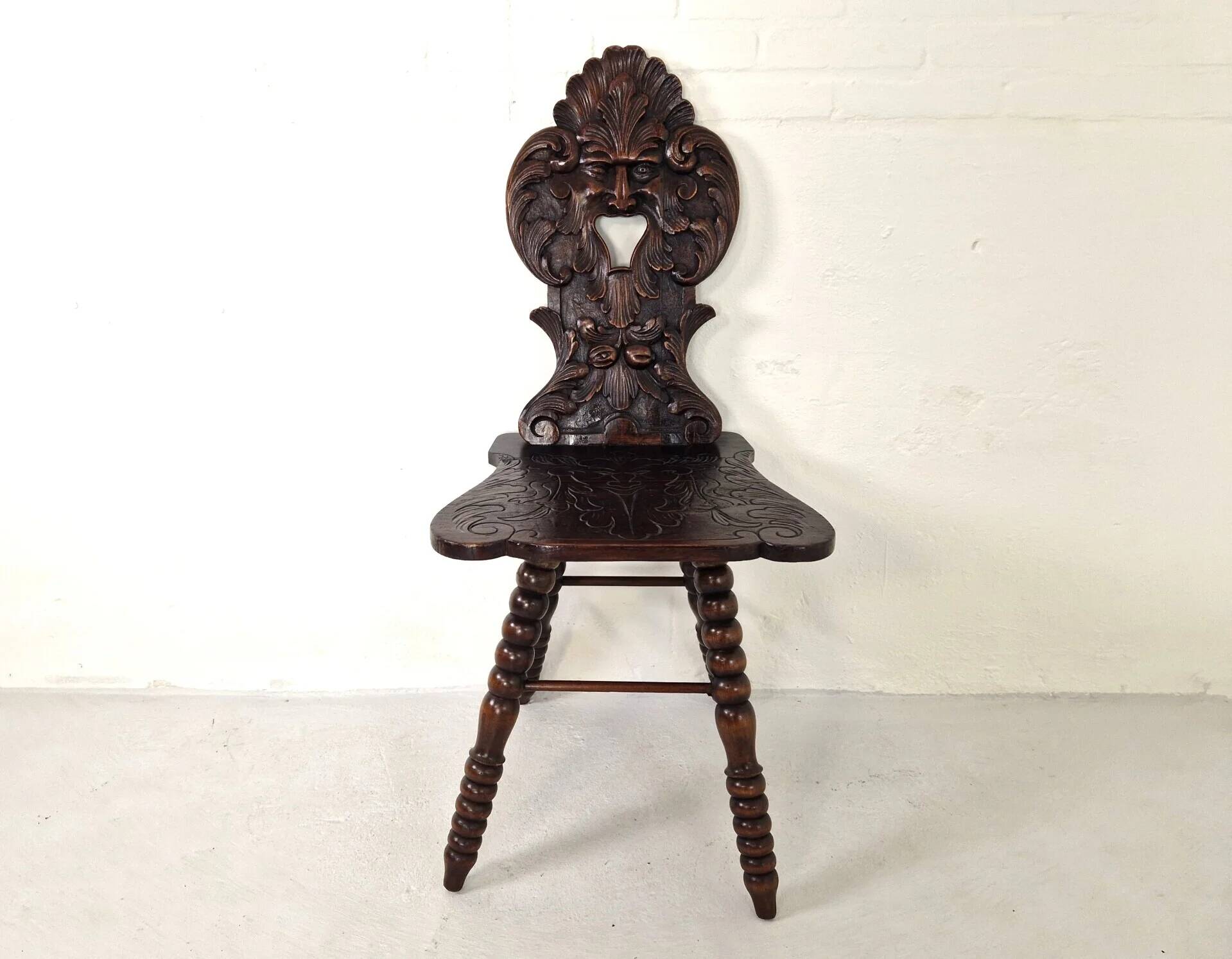Antique Gothic hall chair with bobbin legs
