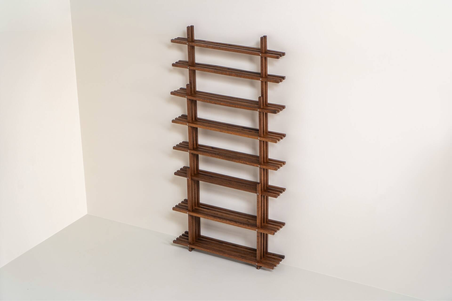 Sculptural wengé slat bookcase (Europe, 1960s).