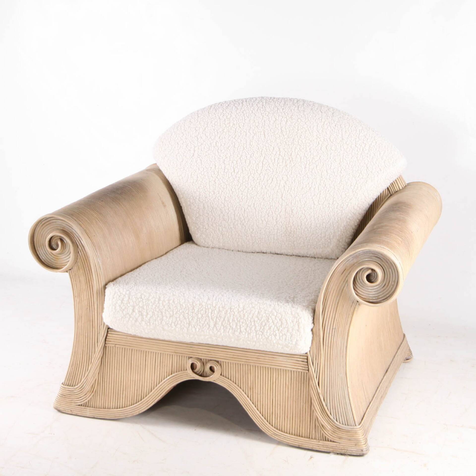 Rattan armchair by Betty Cobonpue