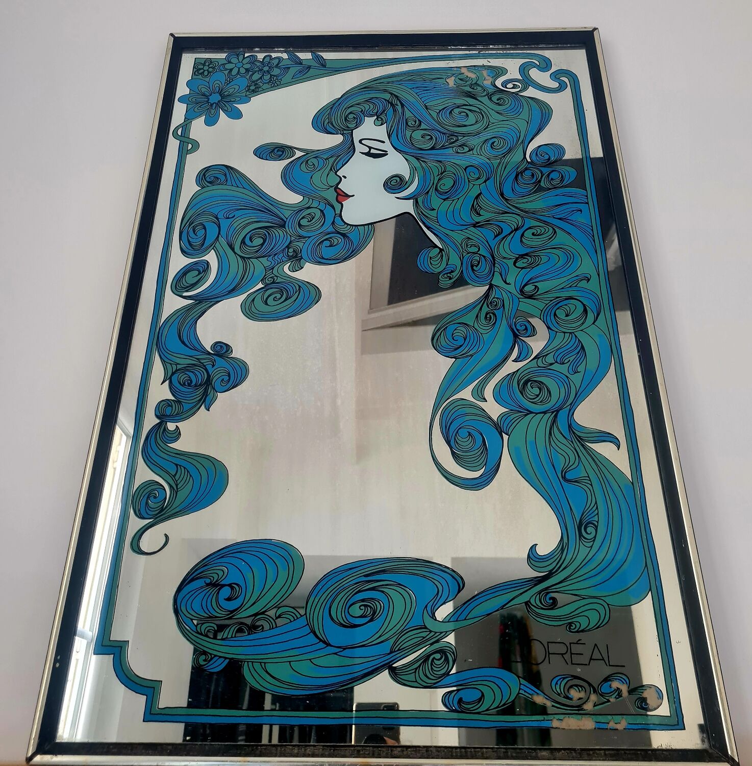Miroir publicitaire L'Oréal des années 70