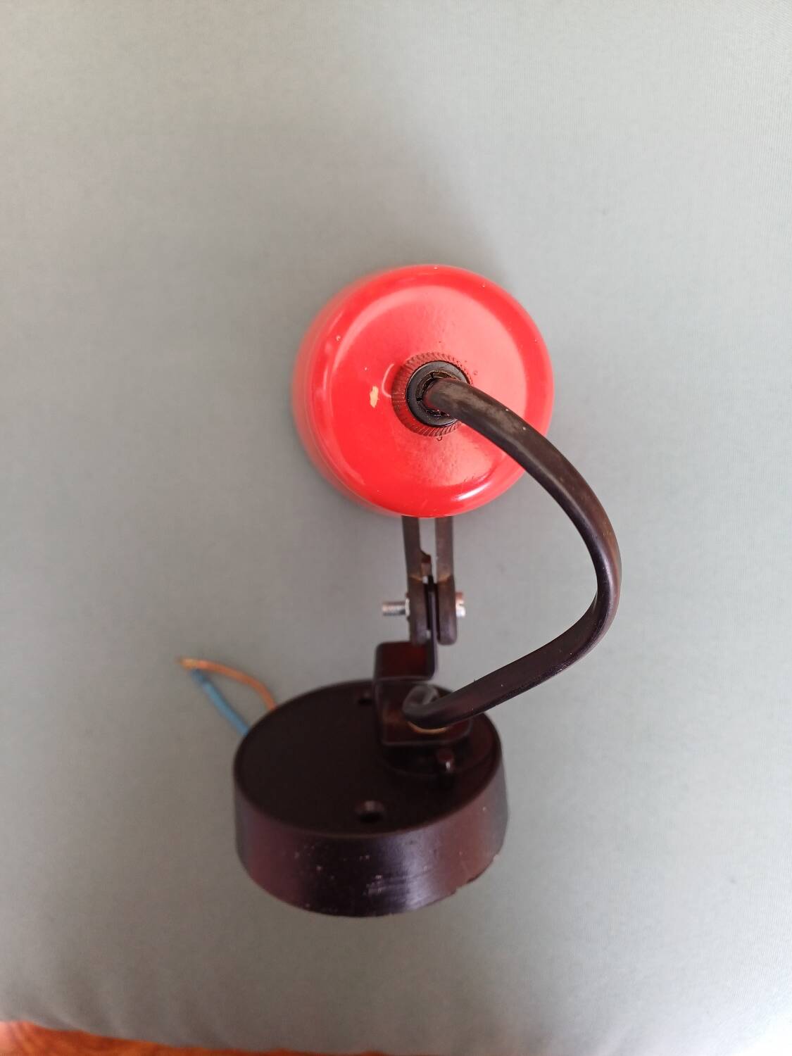 70's red lacquered metal wall spotlight