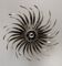 Applique sunburst fer forgé argenté années 60
