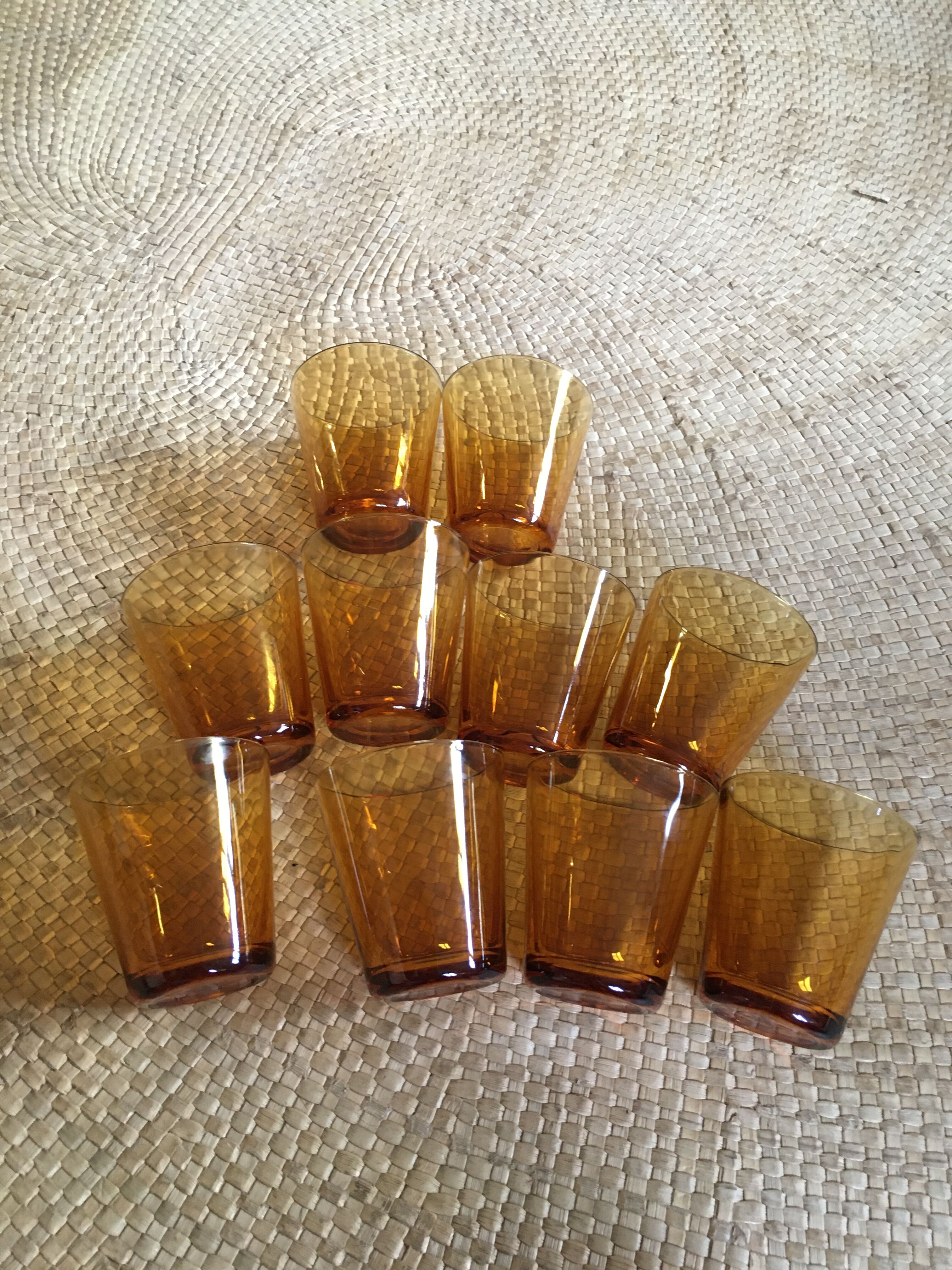 Series of 10 amber glasses