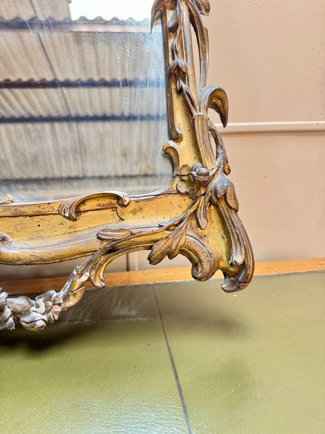 Louis XV period wooden and gilded stucco mirror, 18th century