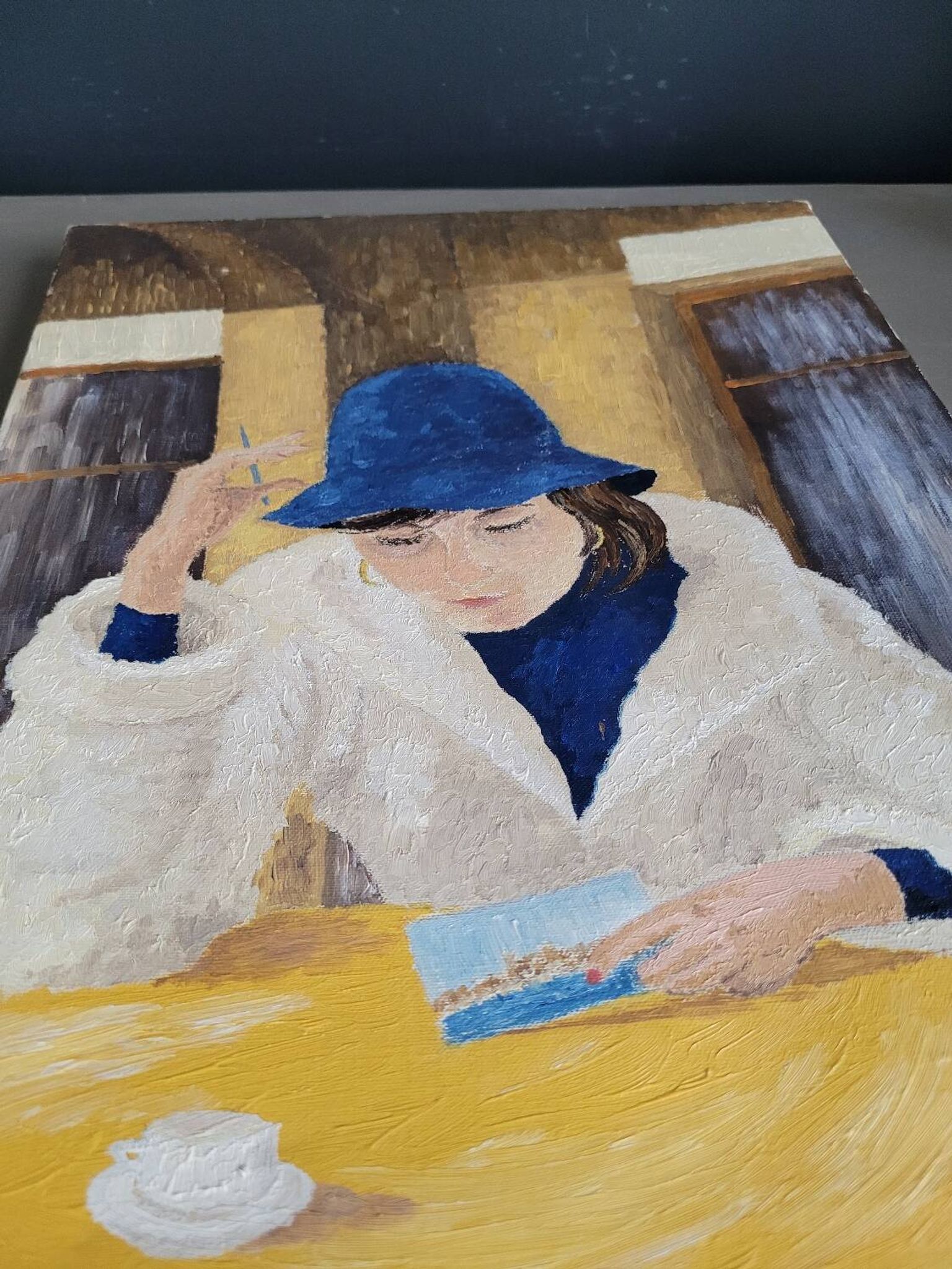Oil on canvas portrait of a woman writing a postcard