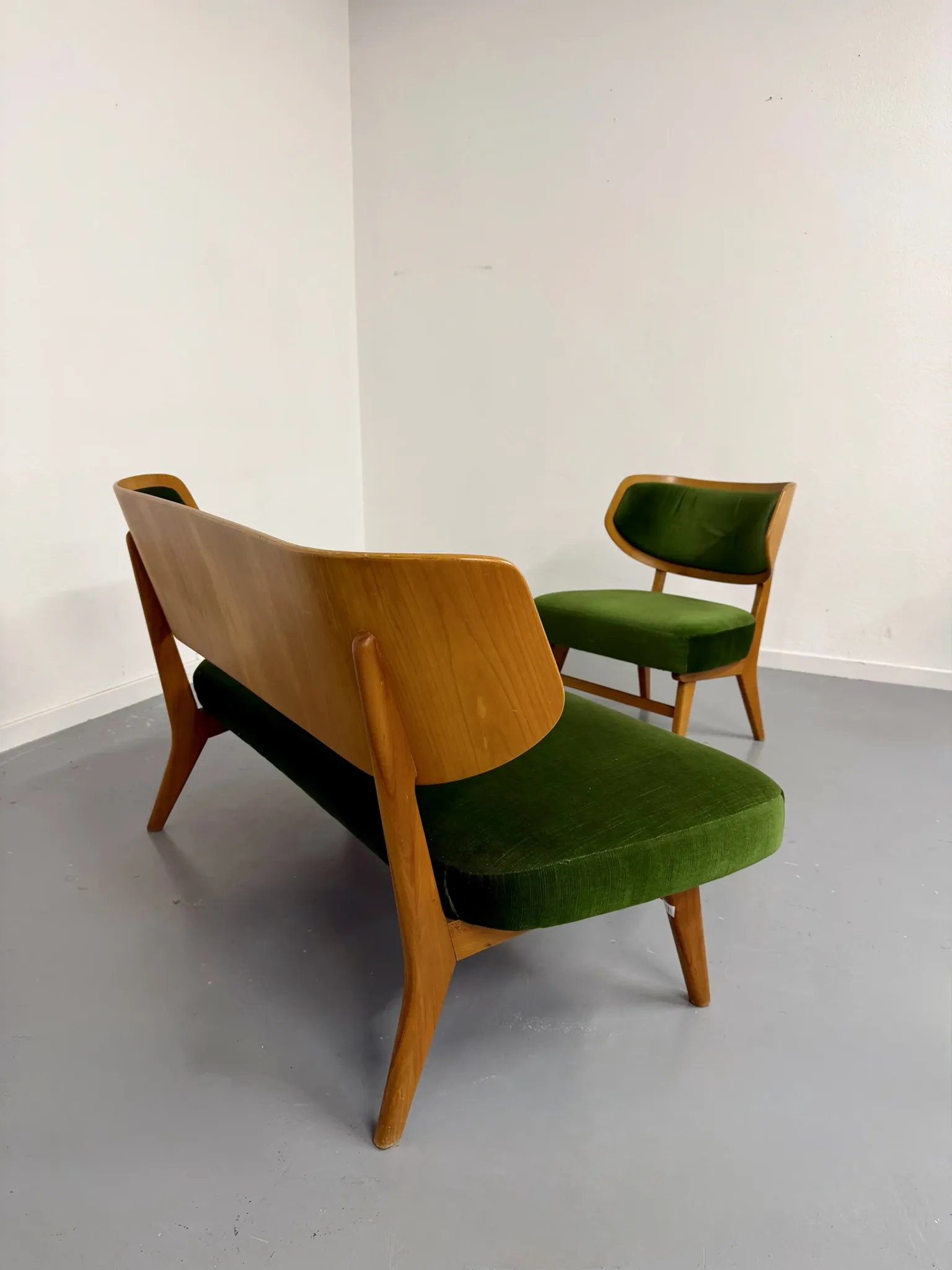 Sofa and armchair designed by Herta-Maria Witzemann, moulded wood, 1960s.