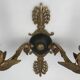 Antique bronze wall light with arm decorated with swans and palmettes in the Empire style