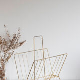 Vintage magazine holder in gold metal