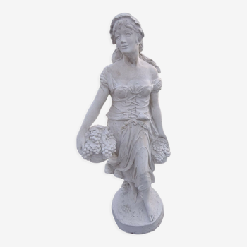 Statue d'une femme vigneronne en pierre reconstituée