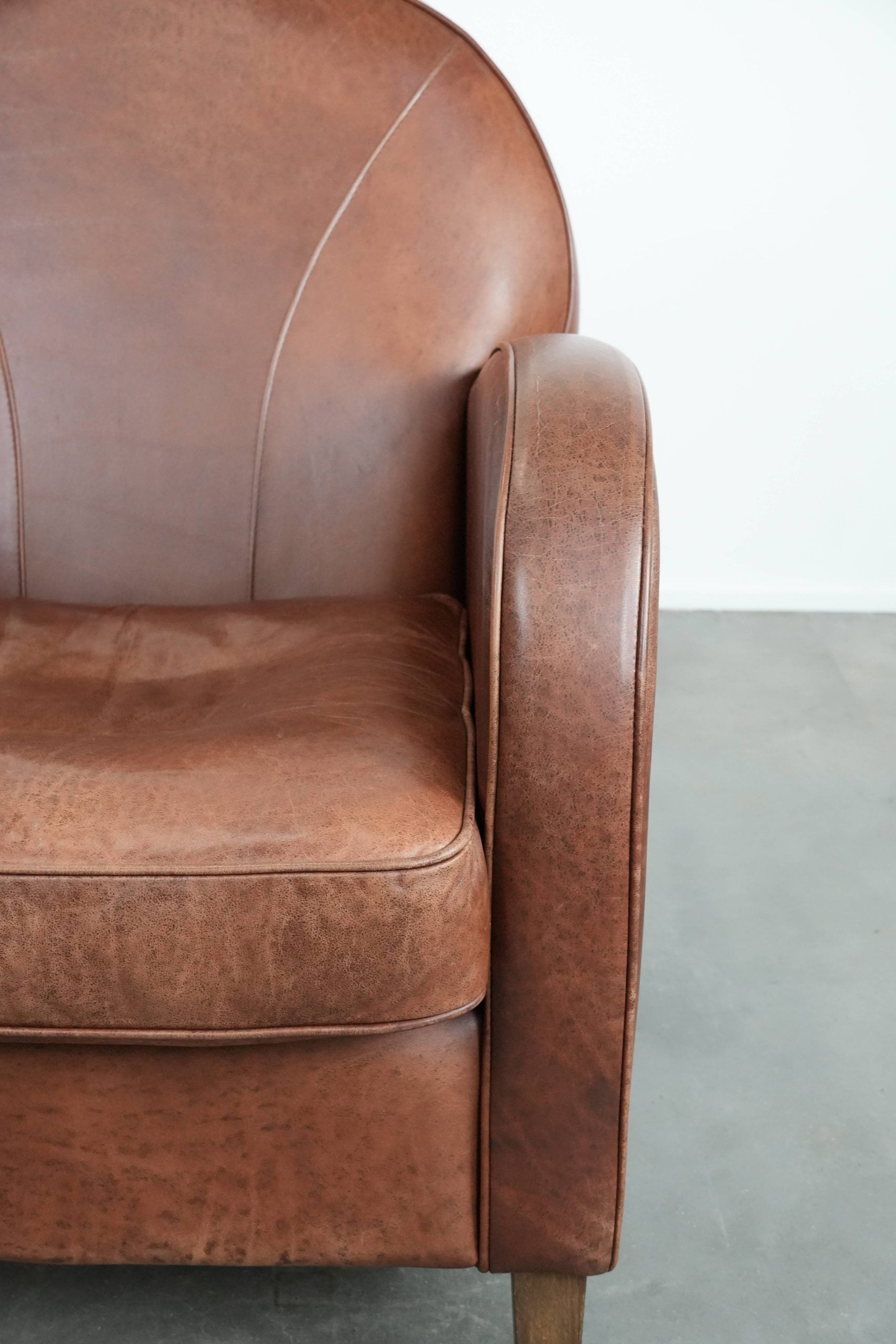 Beautiful art deco design armchair made of cowhide leather in English style