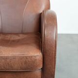 Beautiful art deco design armchair made of cowhide leather in English style