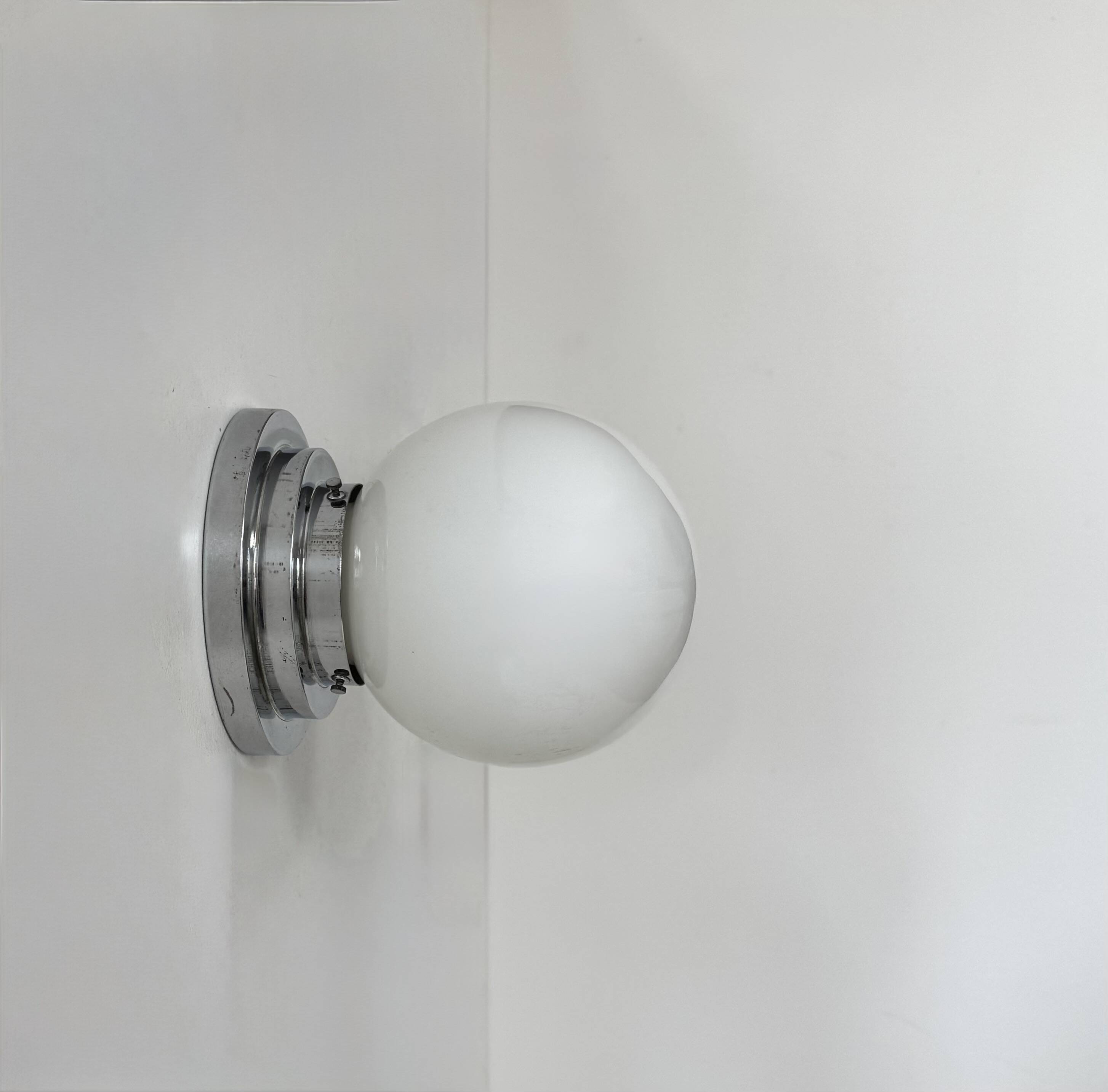 Pair of vintage modernist Art Deco wall lights, chrome and opaline, France