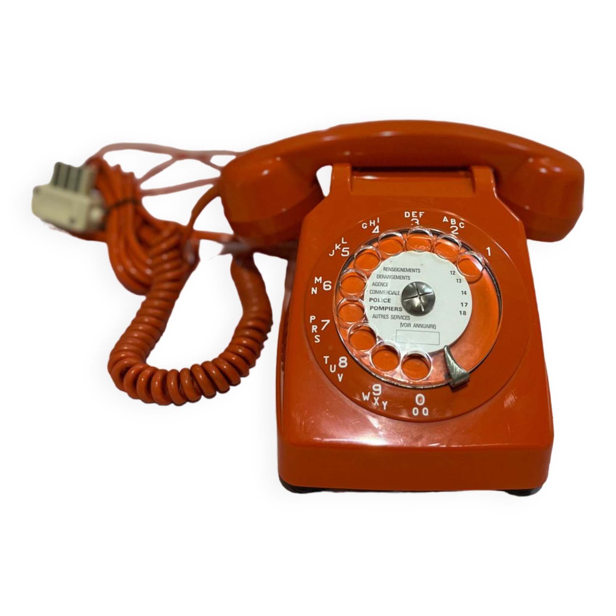 Orange vintage phone with socotel dial