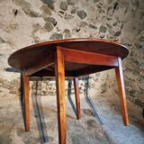 Vintage French round dining table in cherry wood, circa 1920.