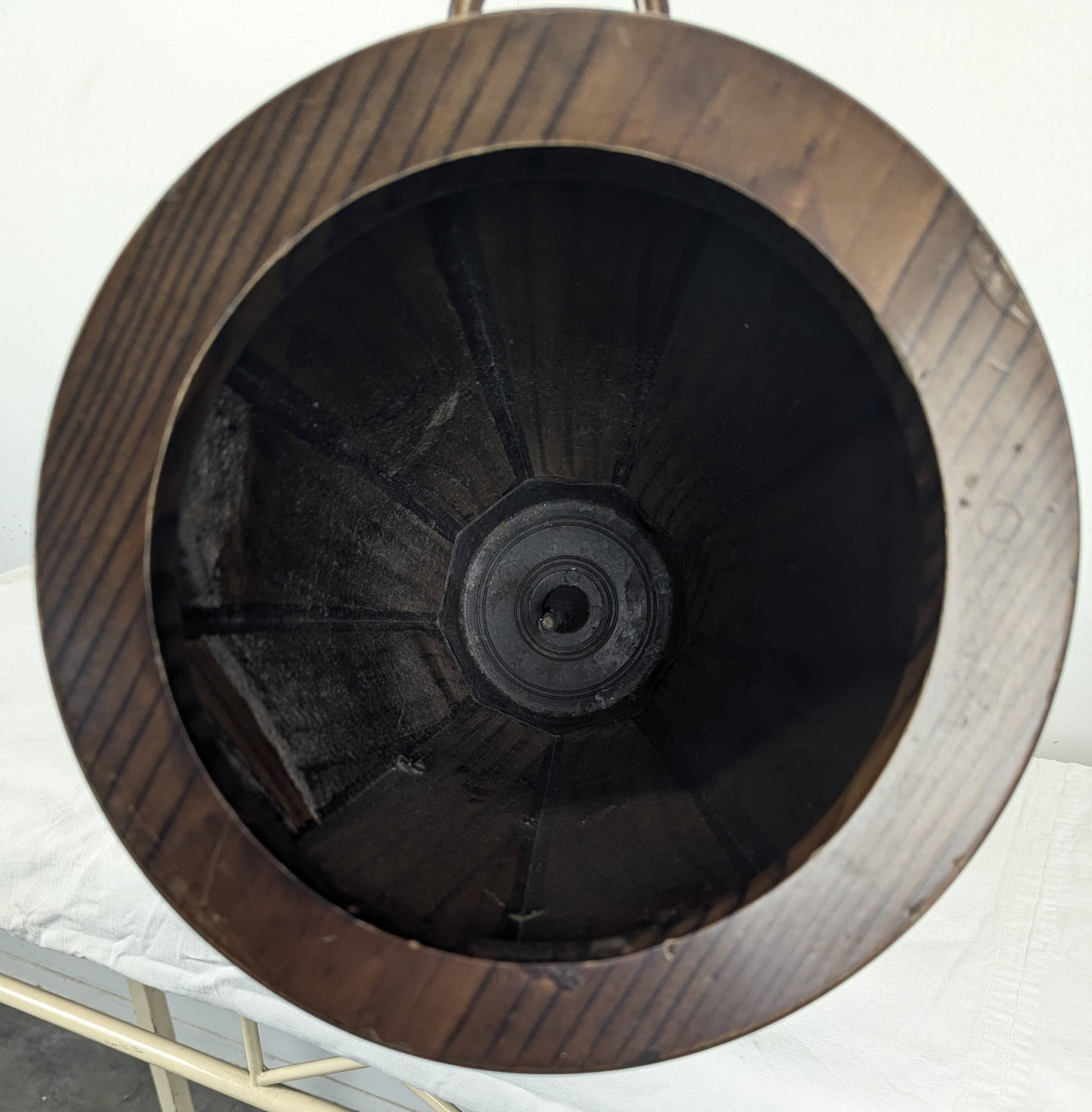 Wooden umbrella stand turned and patinated with iron rings