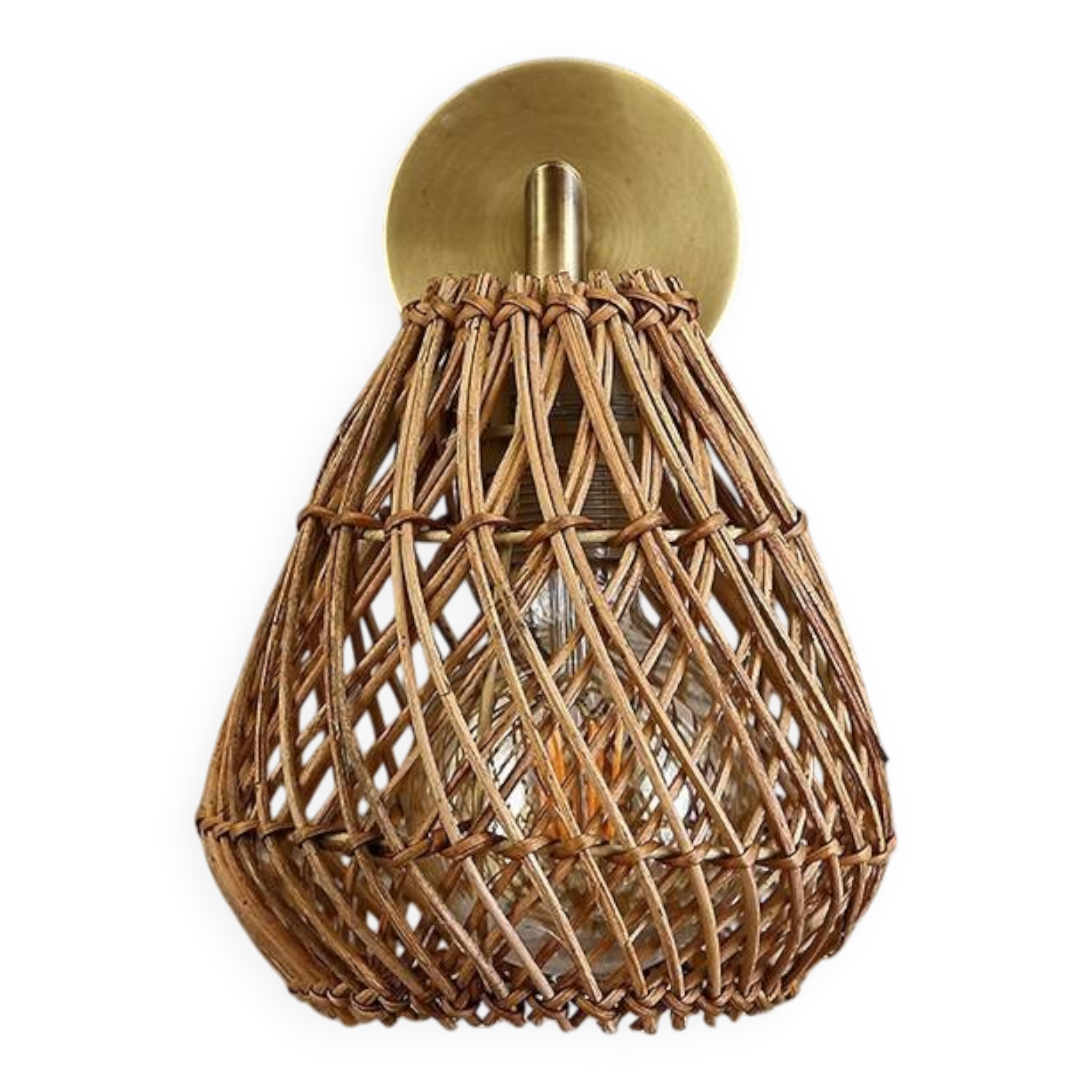 Golden bohemian wall lamp in woven rattan