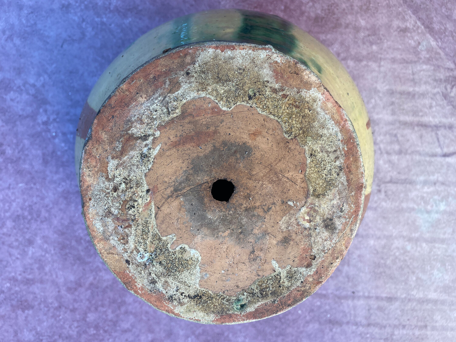 Old glazed terracotta jar