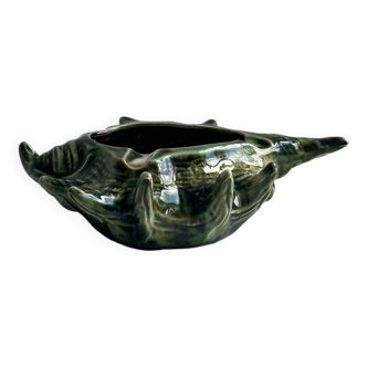 Green shell-shaped ashtray.