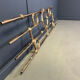 Architectural brutalist wall mounted sculpture made from cast metal.