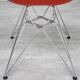 Vitra plastic armchair red poppy by Eames