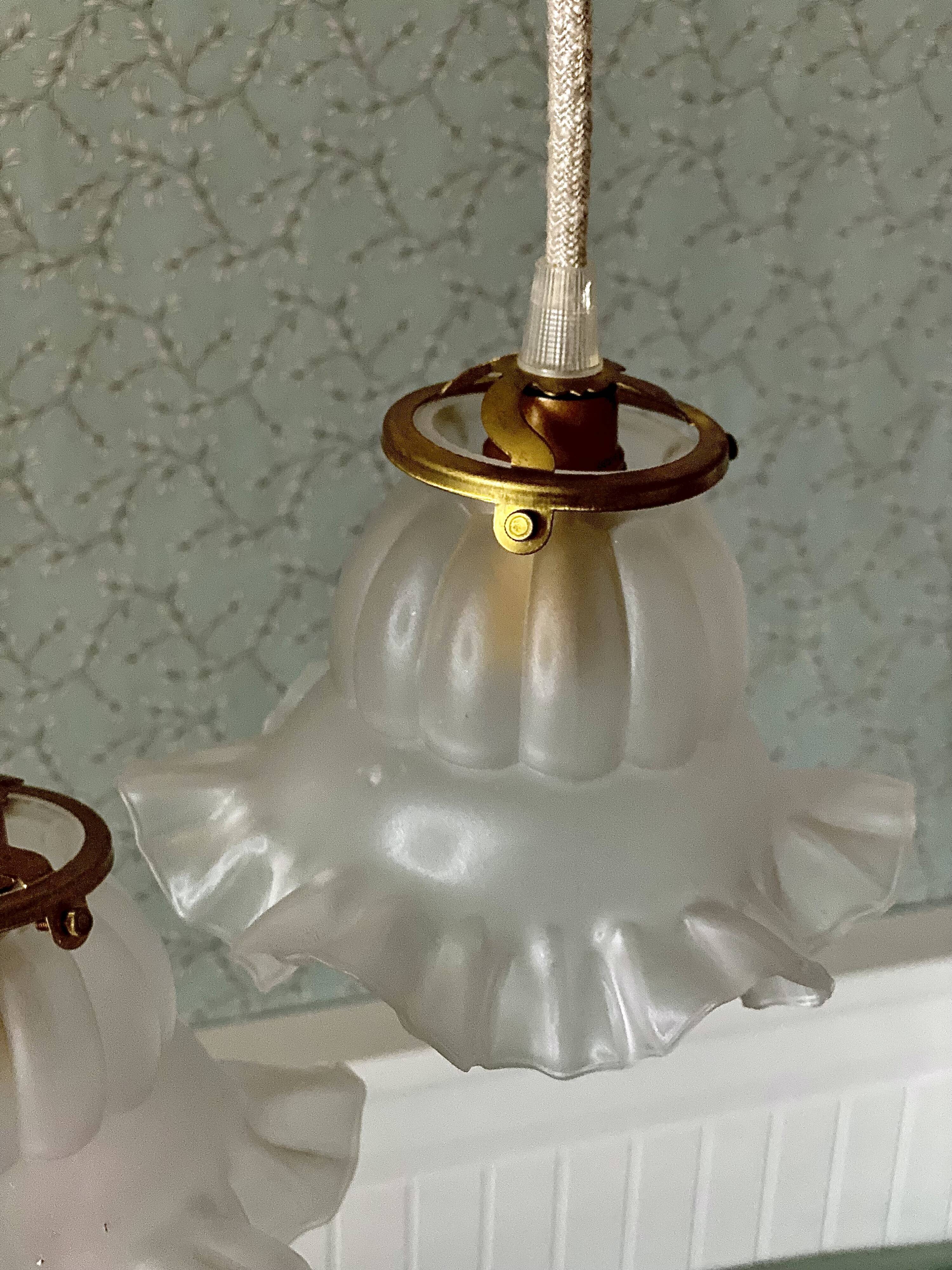 Two vintage tulip pendant lights in molded glass