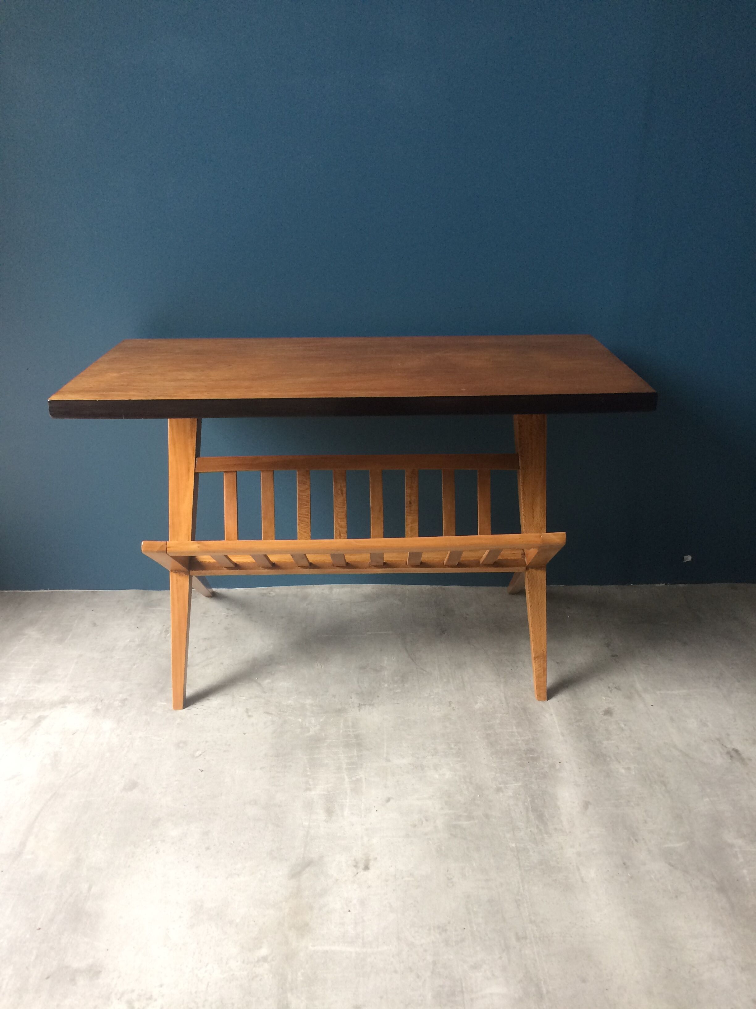 Coffee table, magazine rack with compass feet