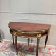Half-moon table in mahogany from the Louis XVI period, 18th century.