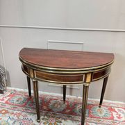 Half-moon table in mahogany from the Louis XVI period, 18th century.