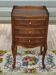 Louis XV bedside table in walnut, 3 drawers, raised edges on the tops.